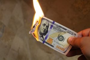 waste money burning